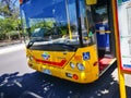 The front of yellow Metro bus is high frequency, high capacity bus network in Adelaide.